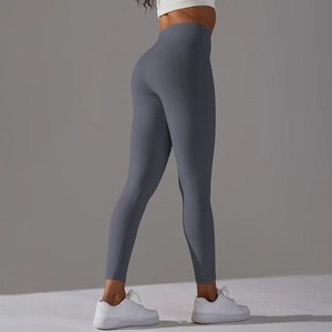 Detail view of high waisted yoga leggings in dark grey with seamless butt lifting design