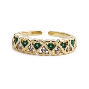 Adjustable golden heart ring with green and white cubic zirconia stones in an open style