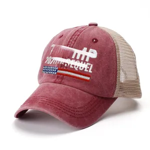 Detail of Trump 2024 embroidery on washed red baseball cap with breathable beige mesh