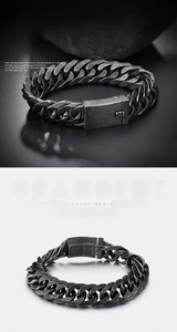 Macro view of vintage style gunmetal curb chain bracelet with square clasp closure