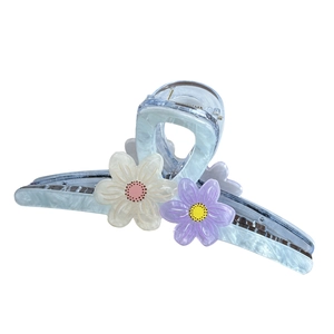 Sweet floral hair claw clip with light blue marble texture and pastel flower accents