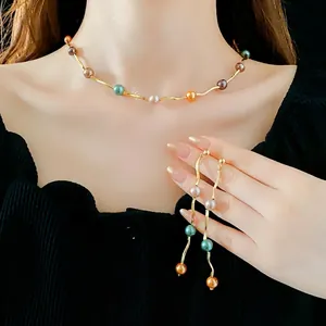 Colorful pearl wave necklace and earring set with golden finish for stylish women