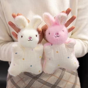 Cute bunny plush finger puppets in pink and white with colorful polka dot star bodies