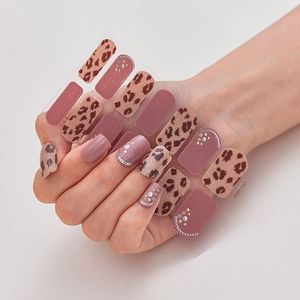 3D laser nail stickers featuring pink patterns and leopard print with pearl accents