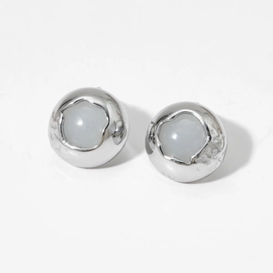 Detailed view of silver stainless steel stud earrings with translucent grey stone inlay