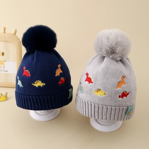 Bonnets tricotés pour enfants avec broderie dinosaure et grand pompon pour l'hiver
