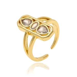 Exquisite 18K gold plated ring with three sparkling zircons on a white background