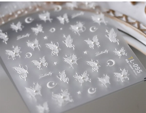 Detail of TL-095 5D embossed nail stickers featuring white butterflies and stars