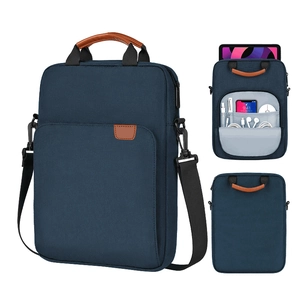 Vertical blue laptop bag with brown leather handles and organized storage pockets