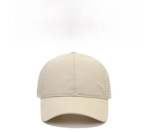 Close-up of beige quick-dry baseball cap featuring breathable side laser-cut vents