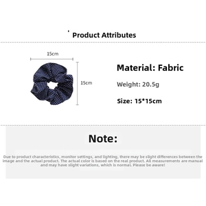 Detailed size and weight specs of a navy blue polka dot fabric oversized scrunchie