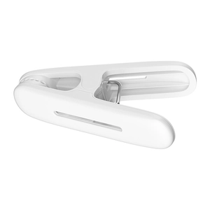 Durable white plastic clothespin with strong metal spring for laundry drying and wind protection