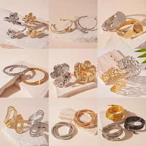 Irregular geometric metal open cuffs in gold, silver and black finishes for women