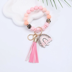 Silicone bead keychain wristlet with LOVE letters and leather tassel on white background