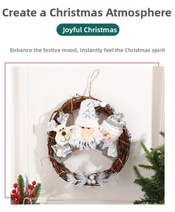 Detail of Christmas rattan wreath with plush Santa, reindeer and snowman figures