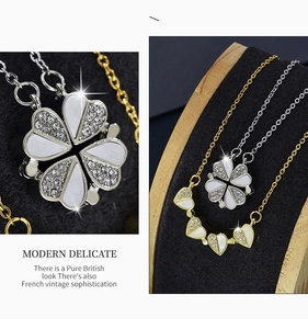 Macro detail of magnetic clover and heart necklace with inlaid crystals in gold and silver
