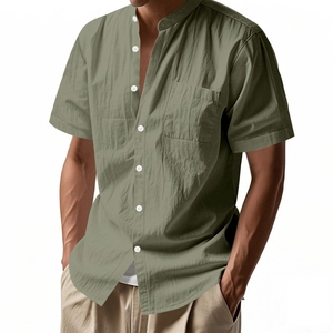 Close-up of olive green linen shirt featuring stand collar and chest pocket detail