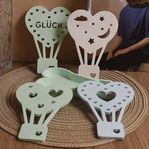Detailed view of heart-shaped hot air balloon silicone molds with Glück engraving