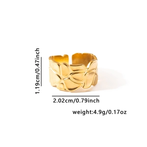 Detail view of gold titanium steel ring showing dimensions 1.19cm height and 4.9g weight