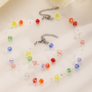 Macro view of colorful faceted crystal beads with silver adjustable lobster clasp