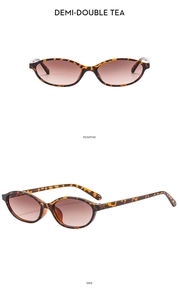 Detail view of vintage oval sunglasses in demi frame with gradient tea lenses