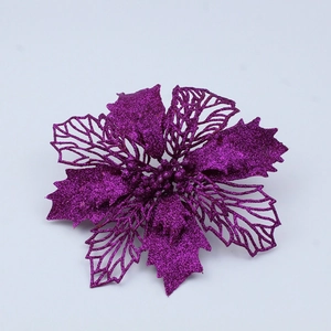Funkelnde lila hohle Weihnachtssternblume mit Glitzer für die Weihnachtsbaumdekoration