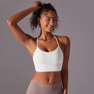 Macro shot of white high-support racerback sports bra with smooth double-sided brushed fabric