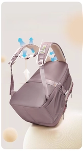 Detail of padded shoulder straps and adjustable chest buckle on purple school backpack
