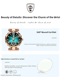 Detail of emerald green sunray dial with diamond markers and faceted diamond-cut glass