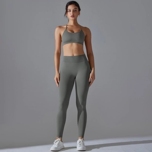 Detail view of seamless olive green yoga set with thin strap bra and high waist leggings