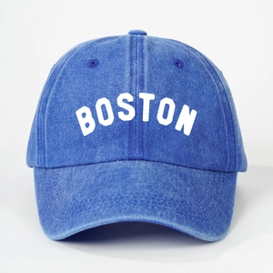 Washed blue denim baseball cap featuring white BOSTON embroidery in a vintage style