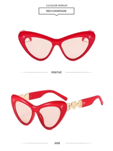 Detailed front and side view of heart-shaped sunglasses with red frames and gold accents