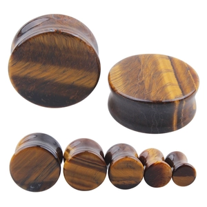 Natural yellow tiger's eye stone ear gauges in various sizes with golden striped texture