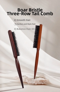 Macro detail of natural boar bristle three-row hairbrush with solid wood pointed tail handle