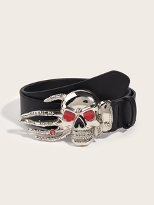 Detailed view of punk leather belt with large silver skull buckle and red eye accents