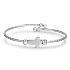 Polished silver stainless steel cable bracelet featuring a central cross and adjustable opening