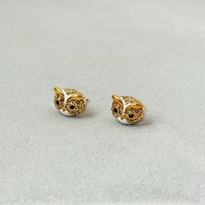 Chic gold owl stud earrings with white enamel and sparkling rhinestones for women