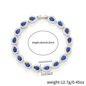 Detailed view of teardrop blue zircon bracelet with silver finish and size measurements