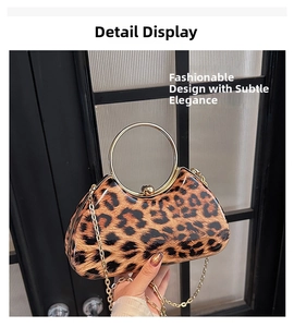 Close-up of leopard print sequins clutch bag with gold round handle and chain strap