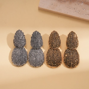 Boucles d'oreilles pendantes double goutte d'eau avec cristaux en gris et doré champagne