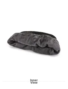 Detail of warm grey plush faux fur lining and black knit edge for winter beanie