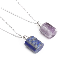 Essential oil bottle necklace with amethyst and lapis lazuli pendants on silver chains