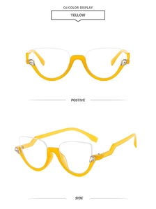 Detail view of yellow cat eye half-frame glasses with teardrop rhinestone accents