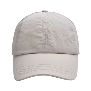 Detail view of quick-dry sun visor showing lightweight nylon texture and reinforced stitching