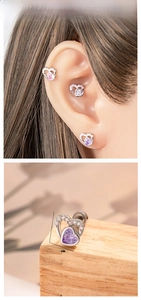 Macro detail of heart zircon stud earrings with precise dimensions 0.7cm and 0.8cm