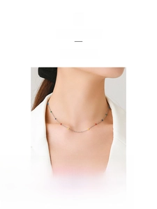 Close-up of S925 sterling silver clavicle chain with colorful beads in minimalist style