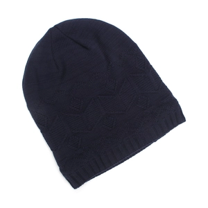 Detail showing knit texture and diamond pattern on warm winter fleece beanie