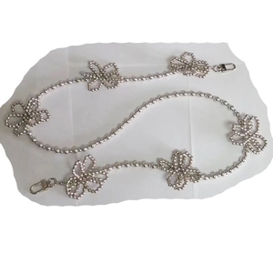 Silver bead chain strap with six floral accents and lobster clasps for crossbody bags