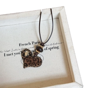 Vintage leopard print heart pendant necklace with resin rhinestones and wood beads