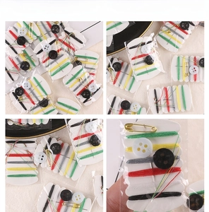 Detail view of portable sewing kit with six color threads, buttons and safety pin